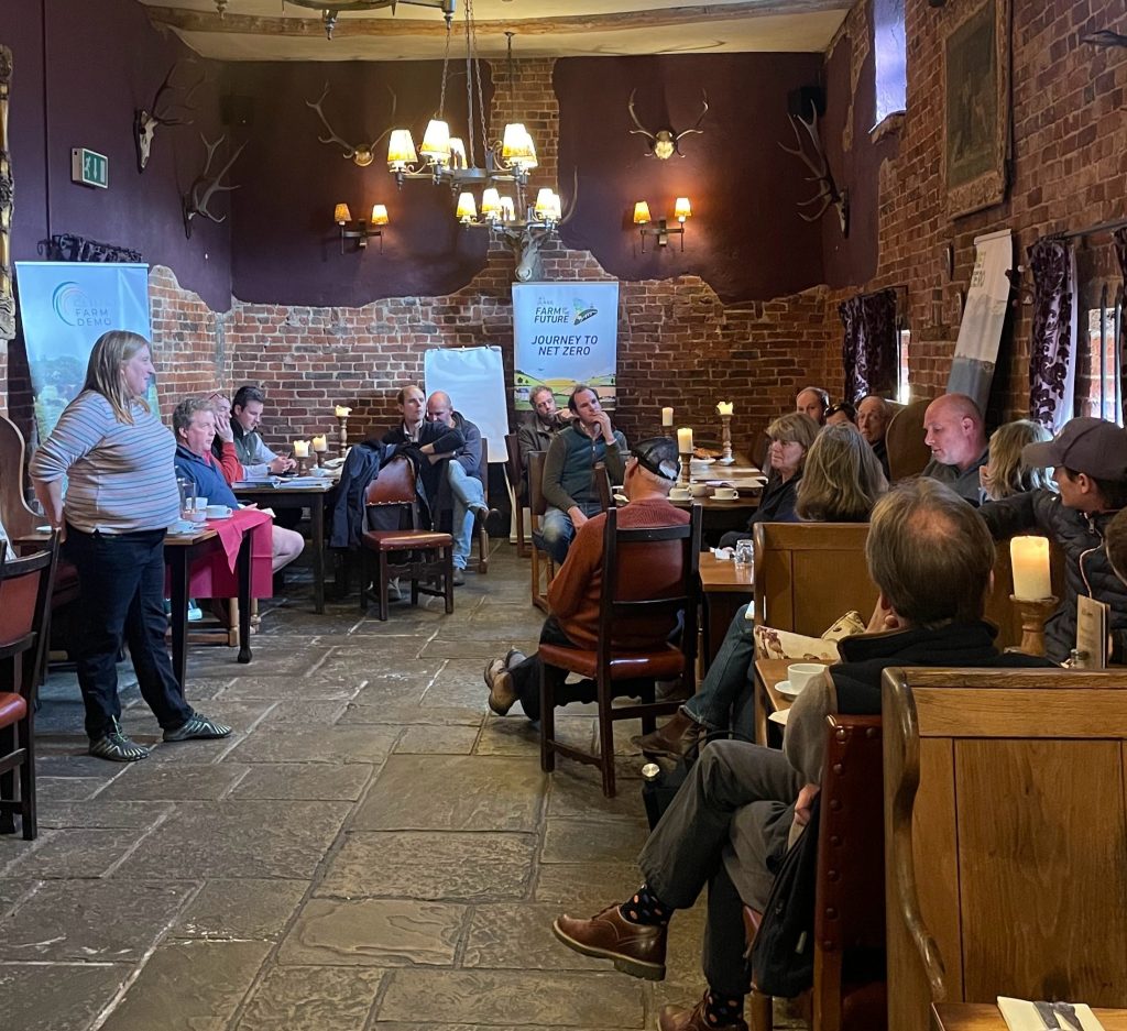 Female farmer presenting to a room of people