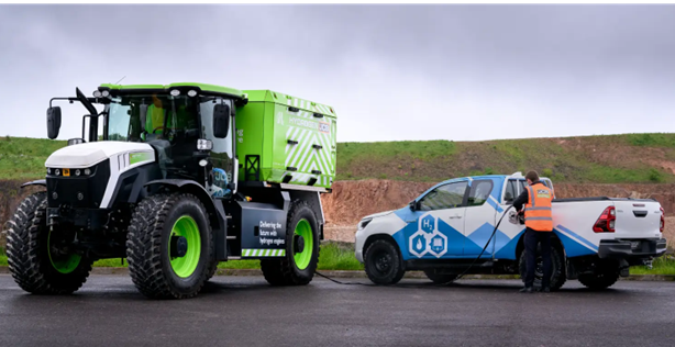 Tractor and pick up truck on tarmac